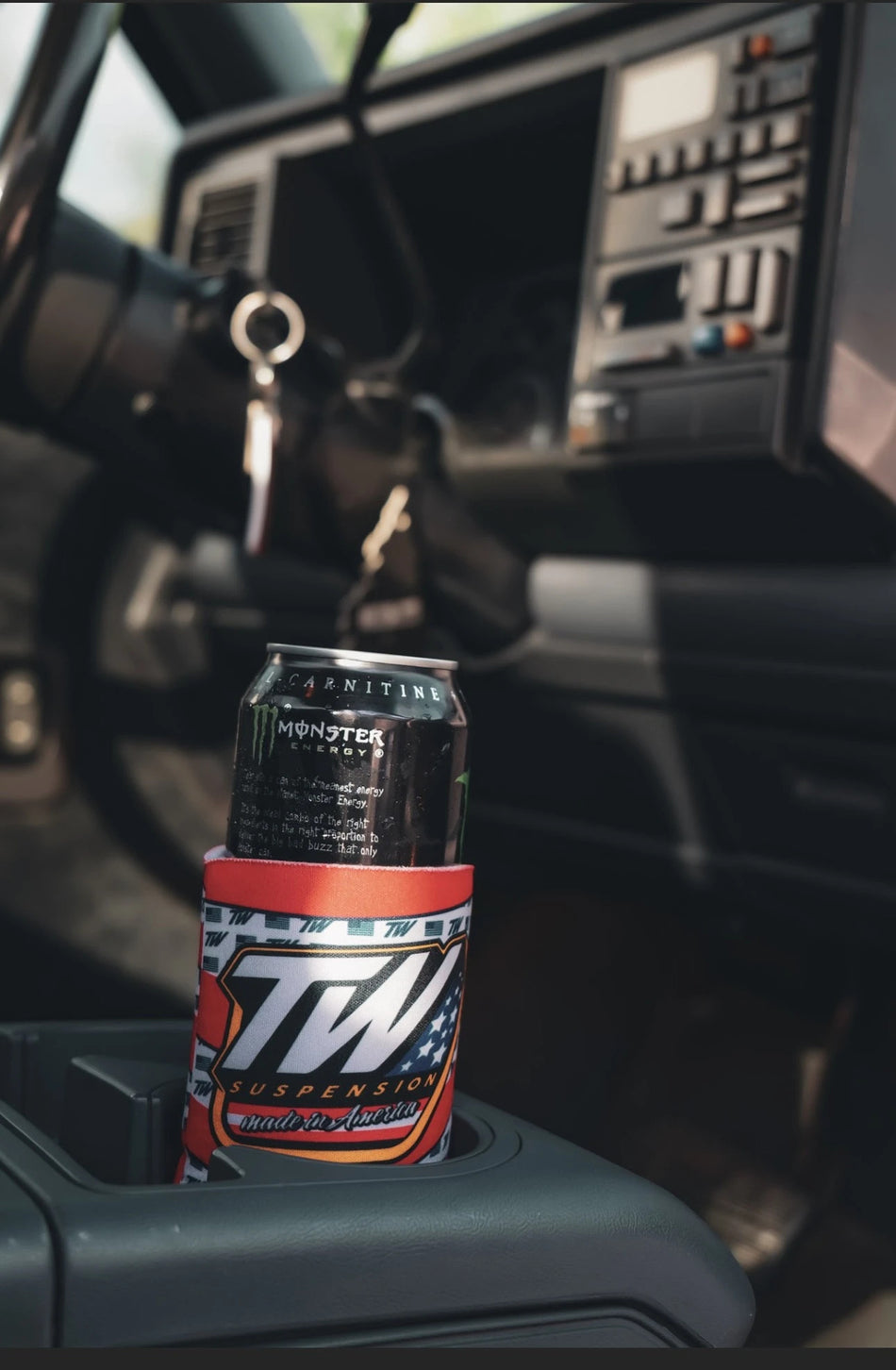 TinWorks koozie in cup holder of classic Chevy